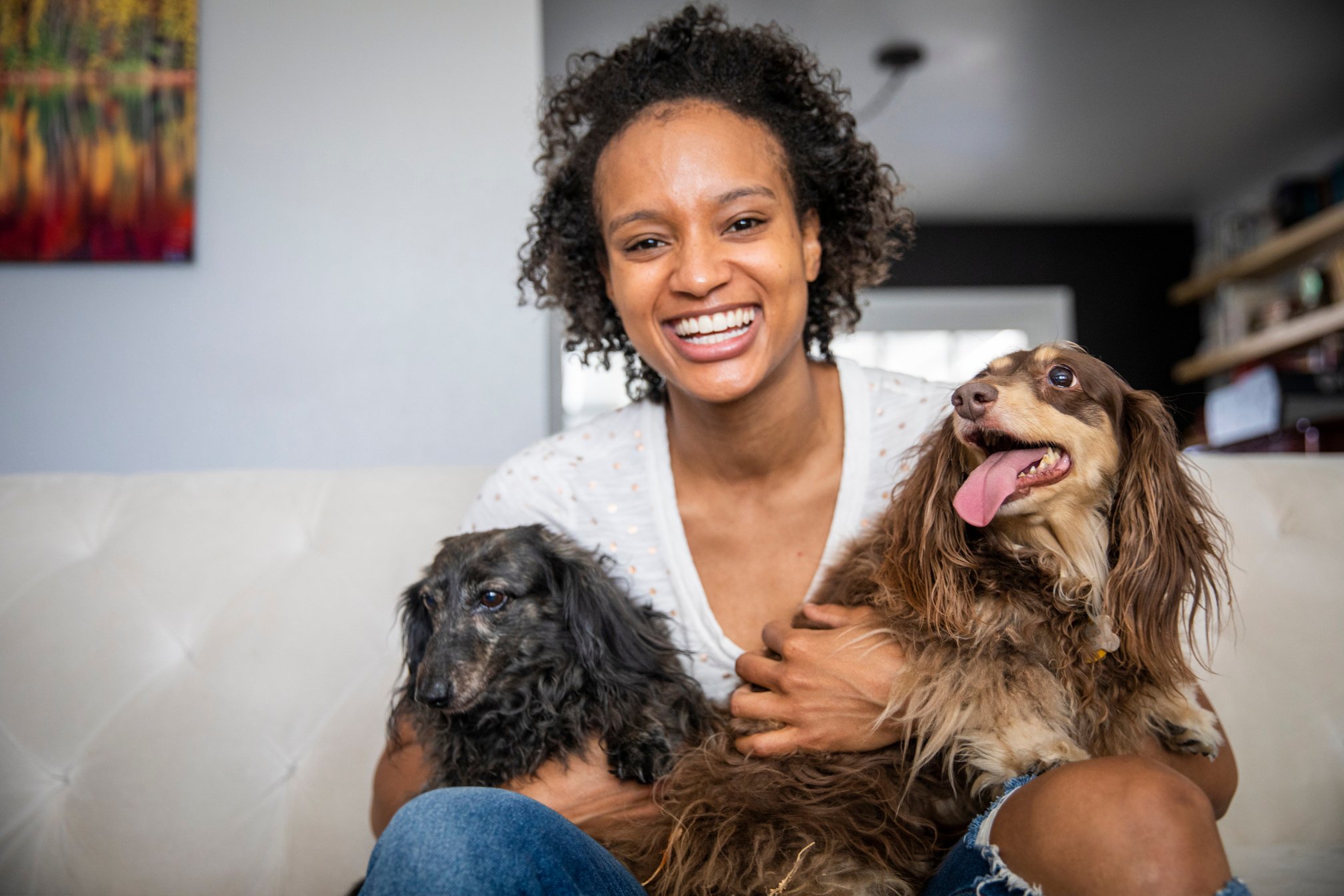 Happy Woman with Pet Dogs